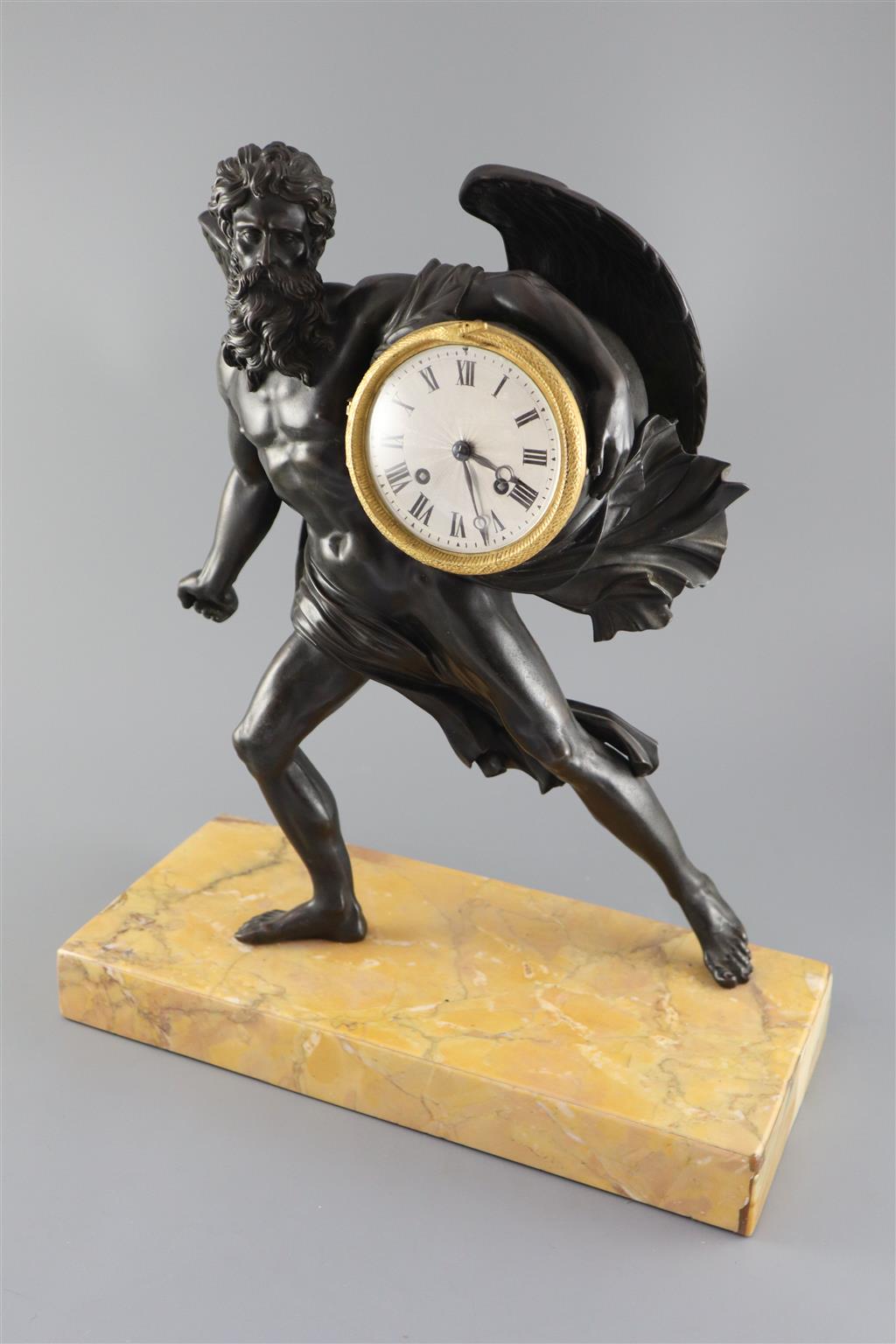 A 19th century French bronze mantel clock, height 17.5in.